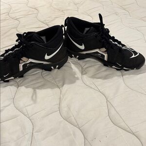 Nike Alpha Black and White Sports Cleats